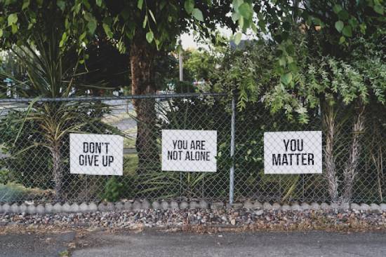 Encouraging words can remind us that we're not alone. This could be why people sometimes put up signs that say things like, 