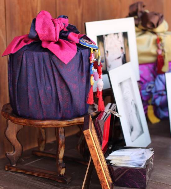 Picture frames and other wrapped gifts, which are commonly given by the groom's family