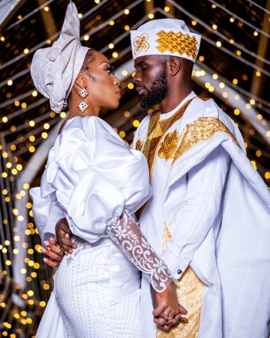 An African couple dressed in traditional wedding attire