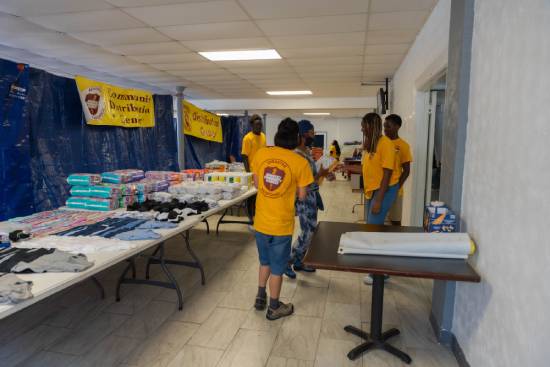 A group of Christian youth working together in a community outreach.