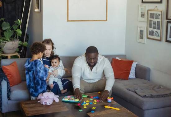 A family playing with toys as part of their routine games for bonding and fun.