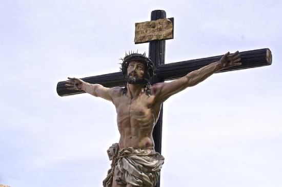 Jesus Christ on the cross asking God to forgive those persecuted and crucified him.
