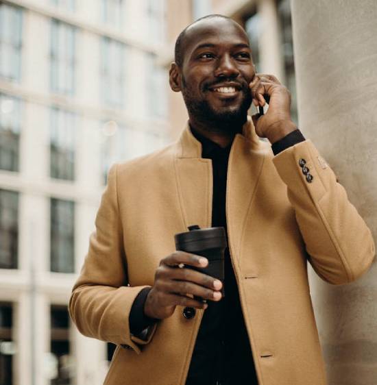A Man Making a Phone Call A man making a call to try reach out to the people he care about.