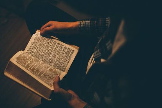 Personal Bible Study A man reading his Bible to find to find encouragement to help with anxiety.