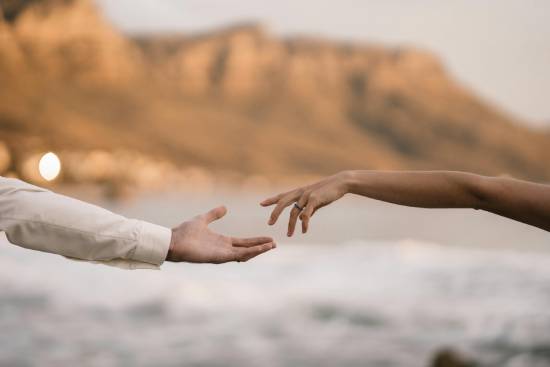 An arm reaching out offer help and support.