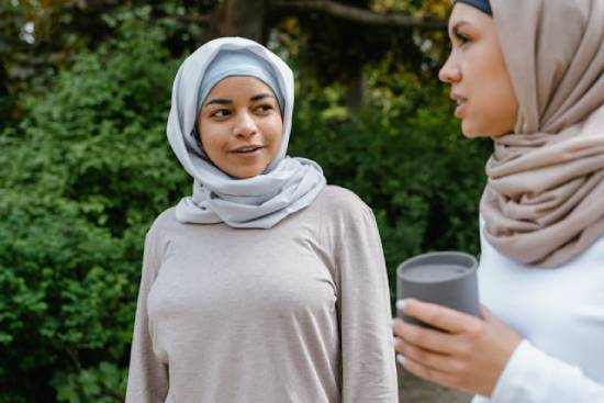 Two Women in Hijab Talking Two women in hijab in a deep talk.